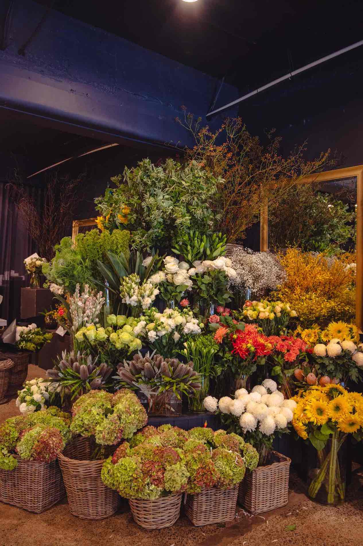 Inside Victoria Whitelaw's flagship boutique in South Yarra, showcasing luxury seasonal flower arrangements at 126 Toorak Road.