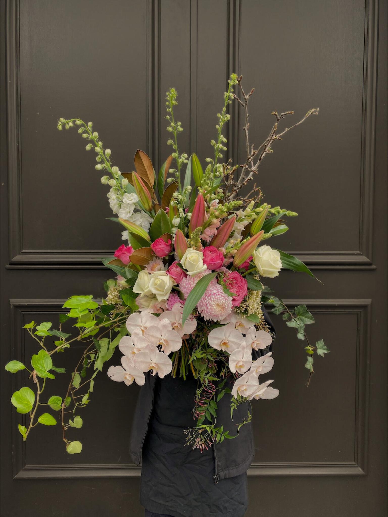Elegant gender-neutral gift arrangement with flowers or plants