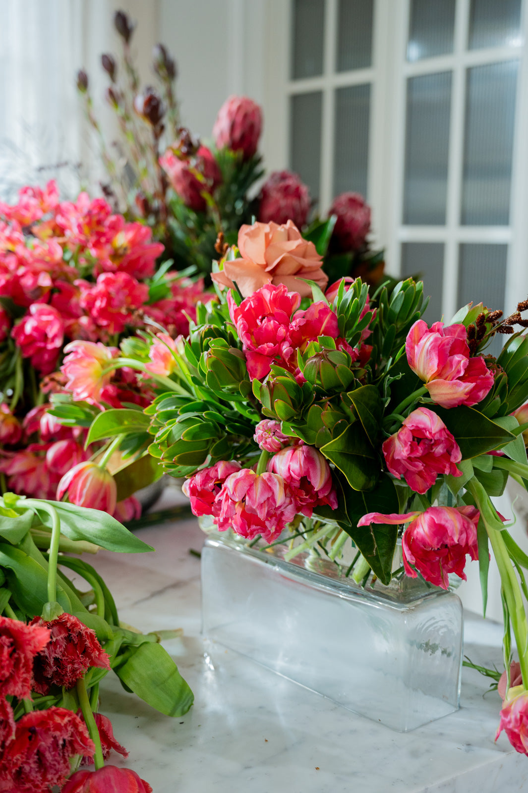 Best selling flower arrangement by Victoria Whitelaw featuring seasonal blooms in luxury vase.