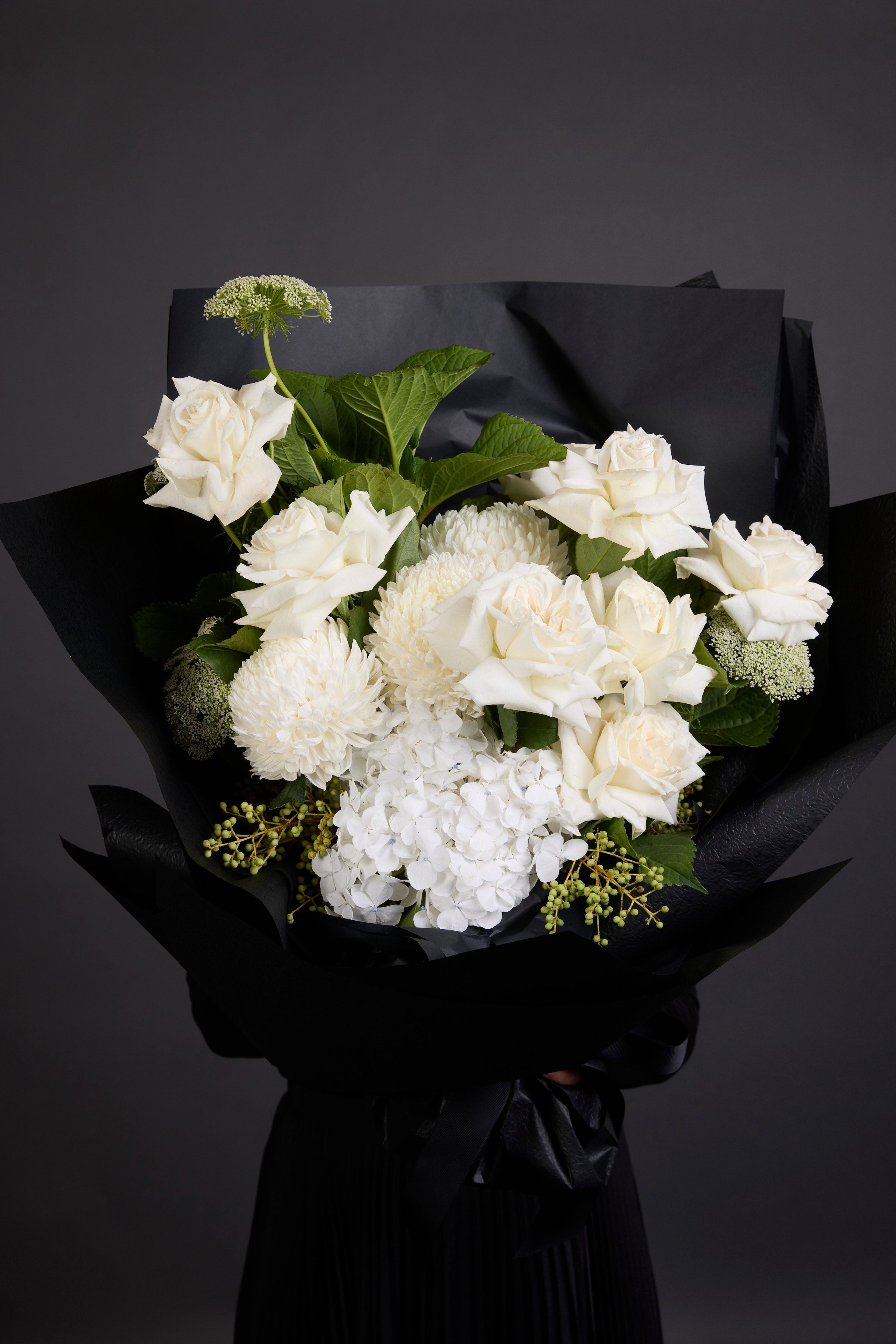 Get well soon flower arrangement by Victoria Whitelaw featuring cheerful seasonal blooms and luxury wrap, delivered in Melbourne