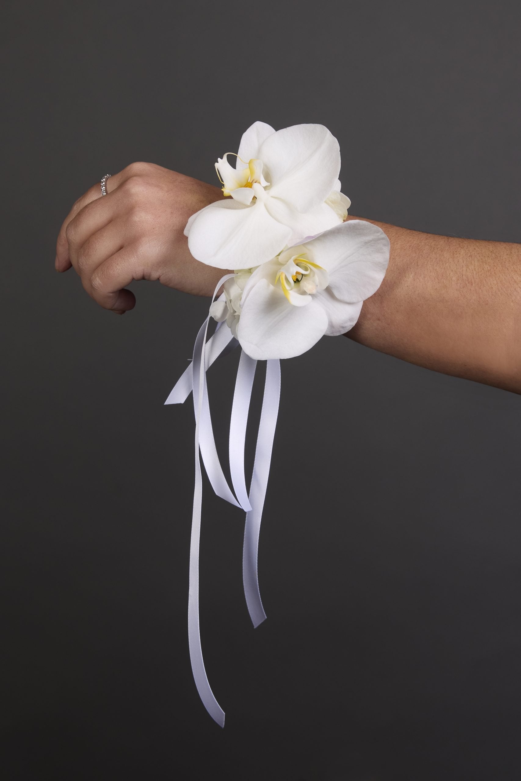 Wrist corsage and rose buttonhole set by Victoria Whitelaw for school formal