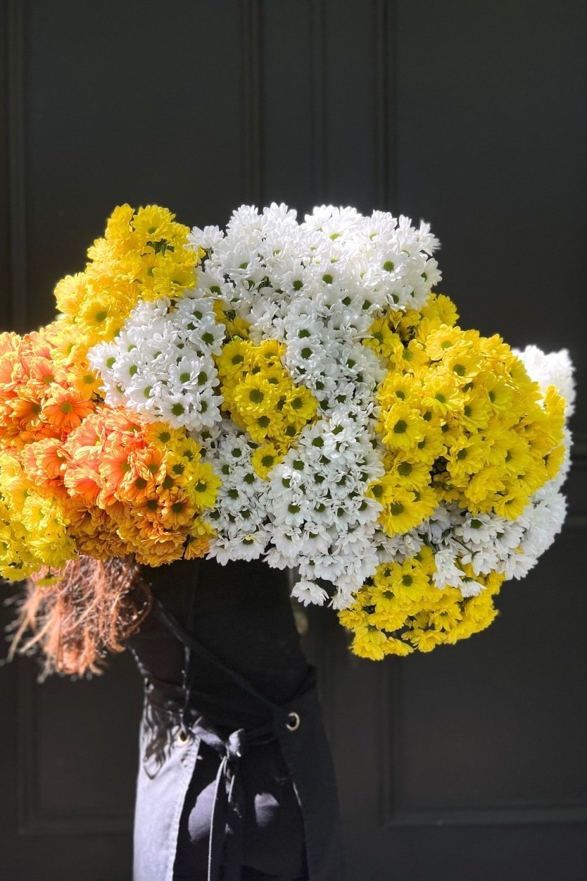 April Birth Flower Bouquet showcasing fresh daisies with seasonal green accents