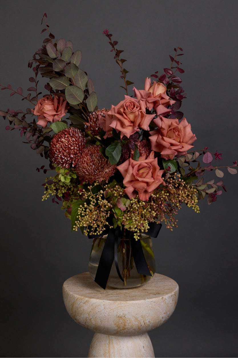 Chocolat bouquet featuring warm chocolate-toned blooms with dark foliage