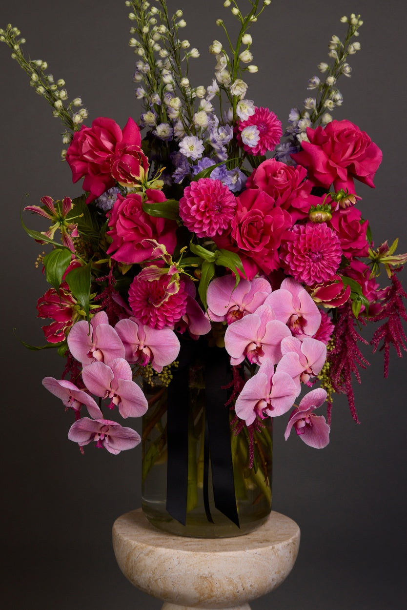 Majesty bouquet featuring pastel and vivid pink seasonal flowers with unique textures