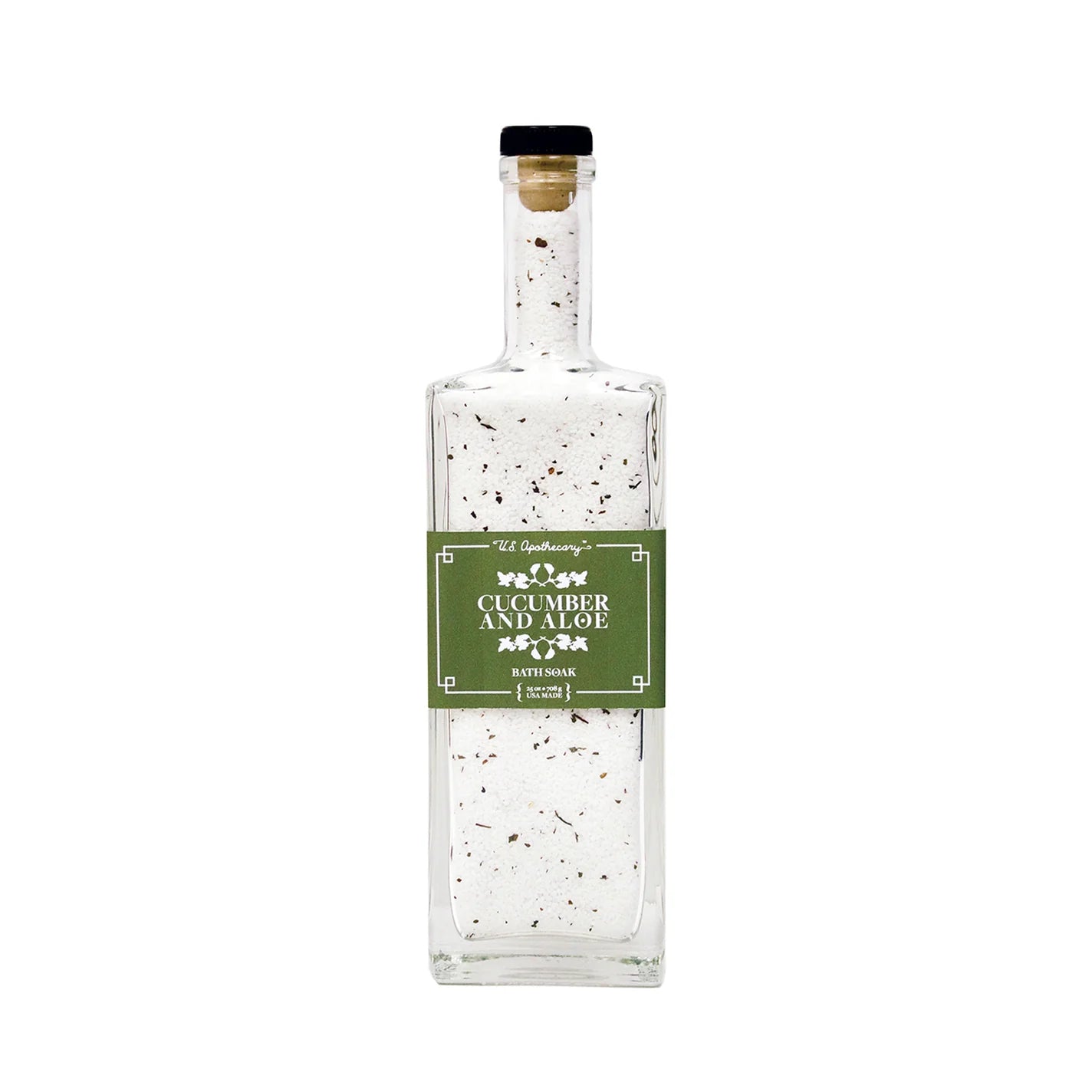 Bottle of cucumber and aloe bath soak with a green label on a white background