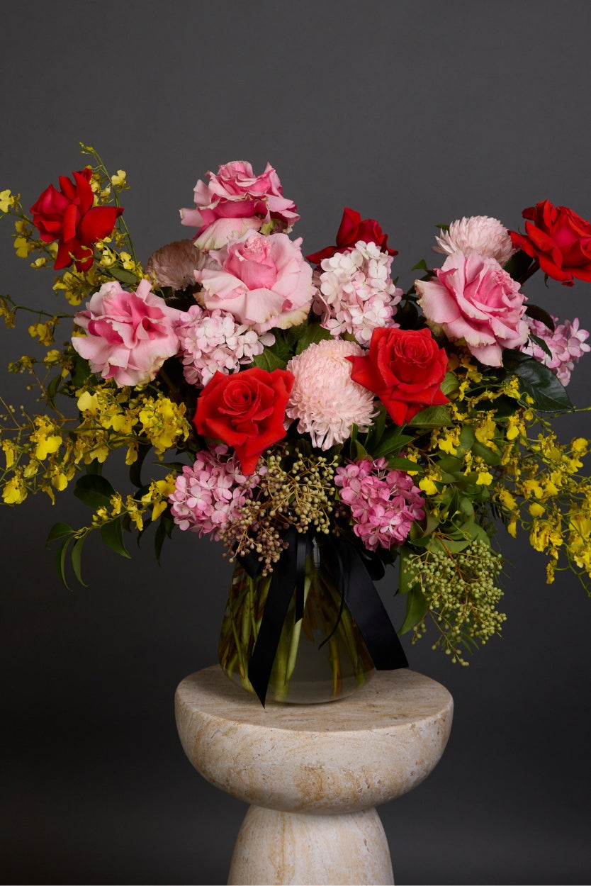 Viva bouquet bursting with citrus yellow, coral, hot pink seasonal blooms – Victoria Whitelaw