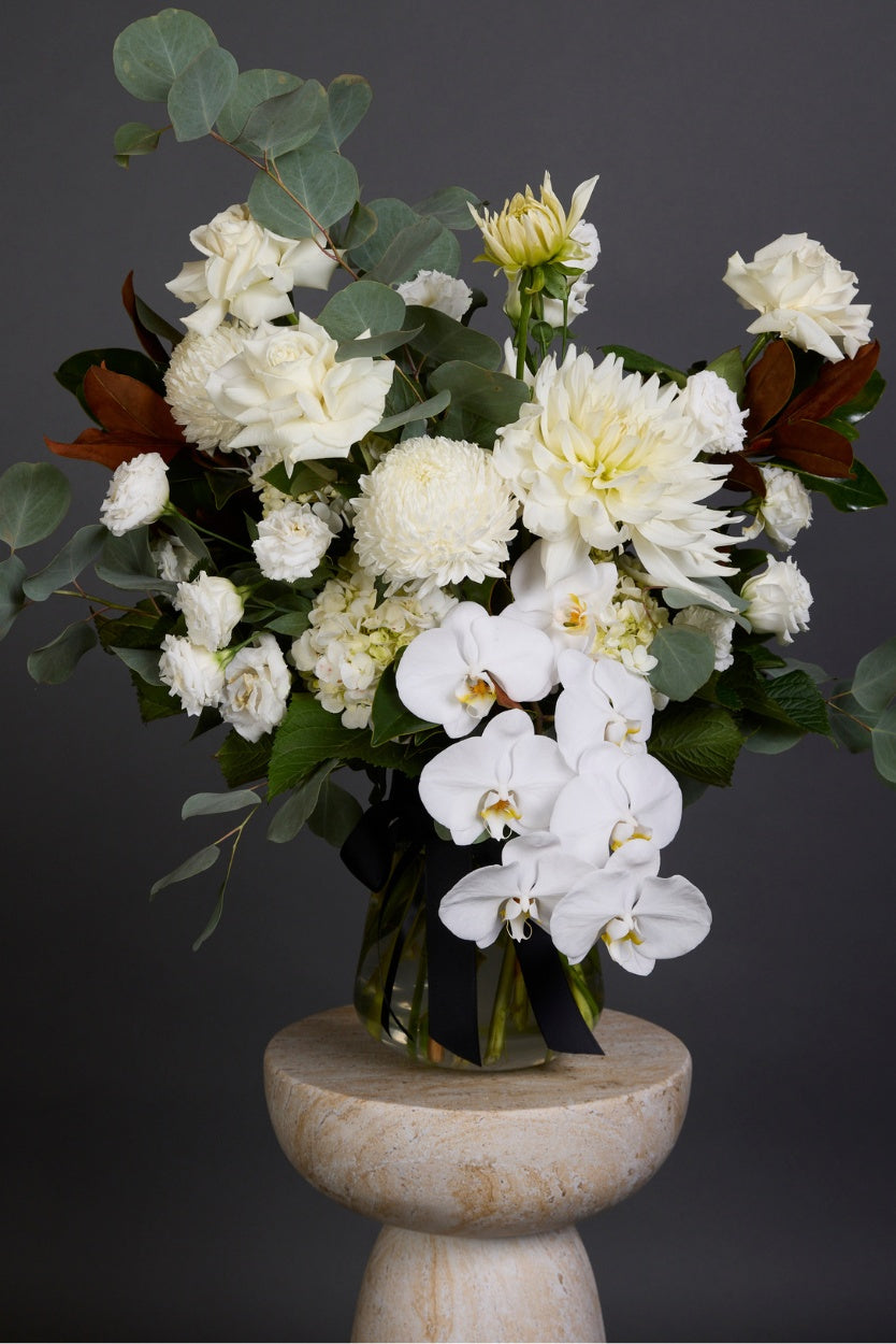 White Delight bouquet with white seasonal flowers and rich green foliage – Victoria Whitelaw Flowers