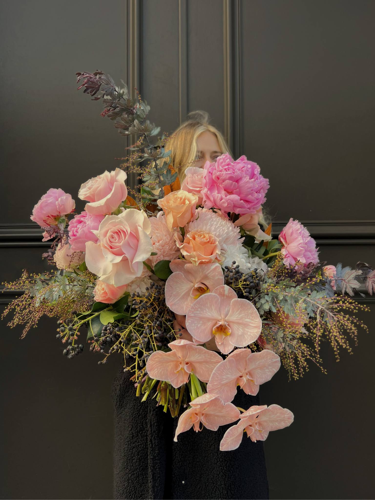 Deluxe gift hamper with flowers and premium treats